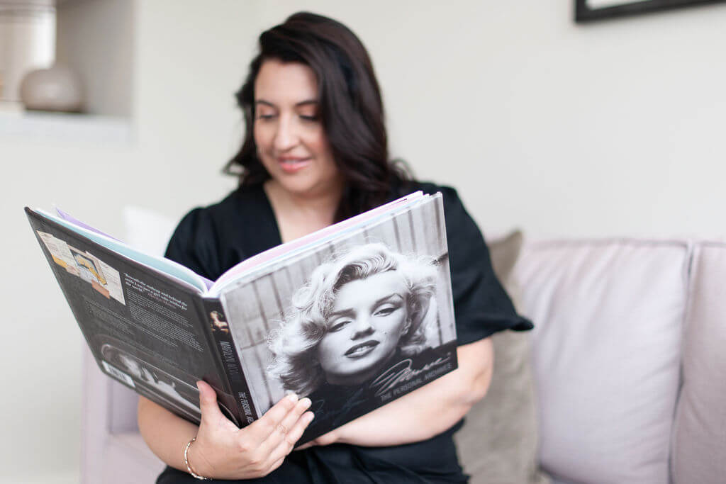the-construction-copywriter-reading-a-marilyn-monroe-book