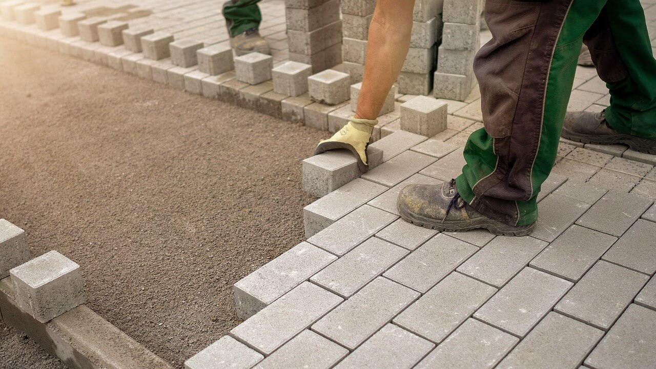 brick-pavers-being-laid-mirroring-the-neat-structure-needed-in-case-studies